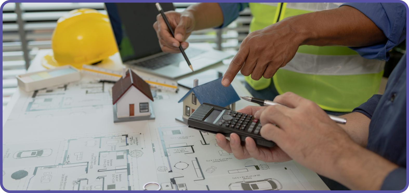 2 men assessing architectural drawings with a small wooden house and calculator
